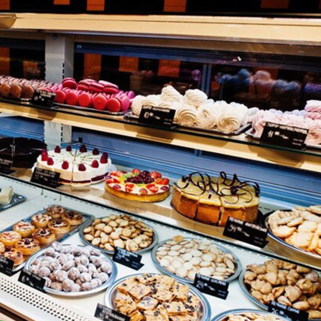 Image of the best bakery in Charlotte, NC, showcasing a variety of baked goods and a welcoming storefront.